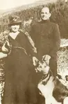 Subhas_Chandra_Bose_and_Wife_Emilie_Shenkl_with_German_Shephard_-_1937.jpg