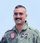 Wing_Commander_Abhinandan_Varthaman_in_a_MiG-21_Trainer_aircraft,_at_Air_Force_S.jpg
