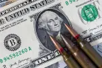 depositphotos_782757020-stock-photo-background-american-dollars-bullets-machine.jpg