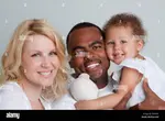 portrait-of-a-biracial-family-isolated-on-white-PDAKKF.jpg