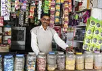 asian-shopkeeper-photograph-indian-36072672.jpg